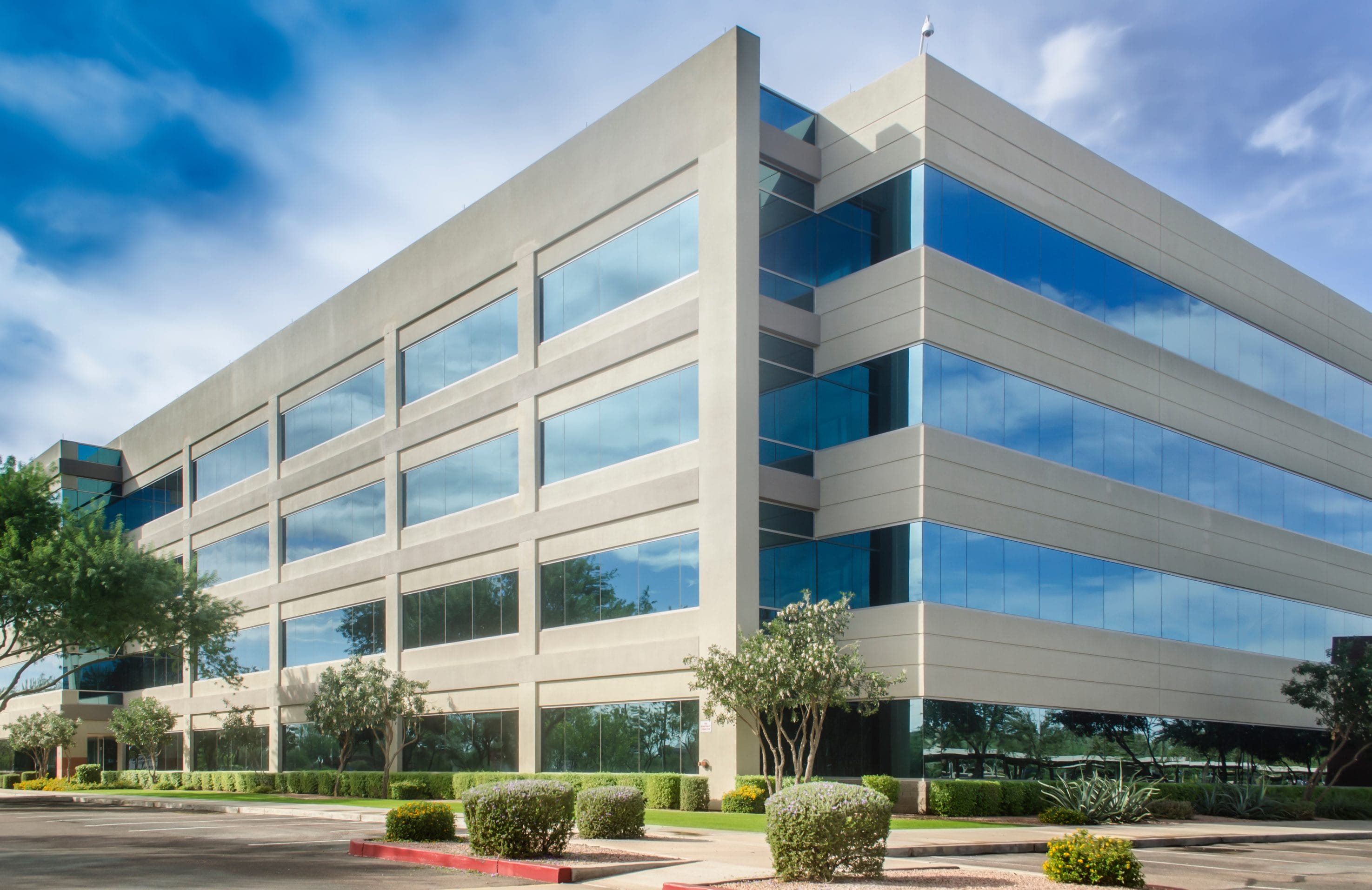 An exterior picture of a large office building.
